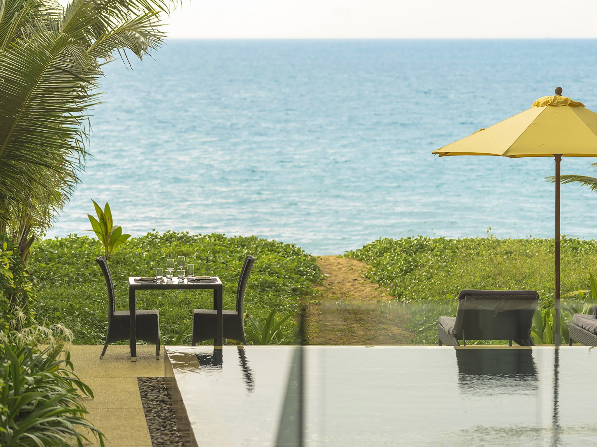 infinity blue phuket outdoor dining with ocean view